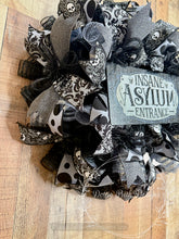 Load image into Gallery viewer, Insane Asylum Entrance Halloween Wreath – Black and Gray Gothic Skulls and Glitter