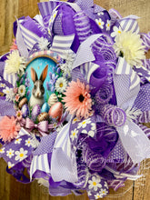 Load image into Gallery viewer, Purple Easter Bunny Wreath with Floral Accents and Decorative Eggs – Spring Front Door Decor