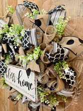 Load image into Gallery viewer, Farmhouse Bless This Home Wreath with Neutral Burlap, Black and White Ribbon, and Greenery – Approx 25 Inch Door Wreath