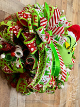 Load image into Gallery viewer, Green Monster Christmas Wreath with Santa Hat, Red and Lime Green Ribbon and Ornaments