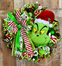 Load image into Gallery viewer, Green Monster Christmas Wreath with Santa Hat, Red and Lime Green Ribbon and Ornaments
